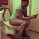 A black woman with short hair records herself pissing, farting and shitting while sitting on a toilet. She shows us her finished product in the toilet bowl. She talks about her latest cleansing diet. Over 10.5 minutes.